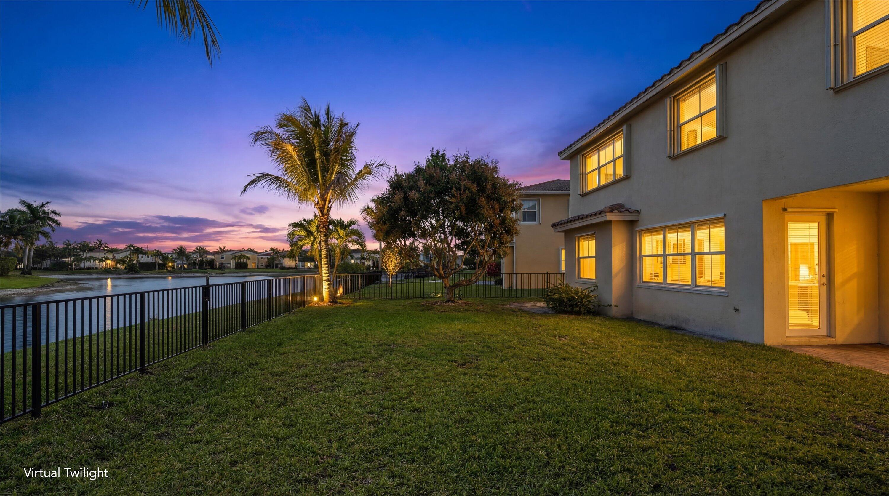 3072 Payson Way Wellington, FL 33414 - Photo 32 of 43 a view of a house with a yard and pathway
