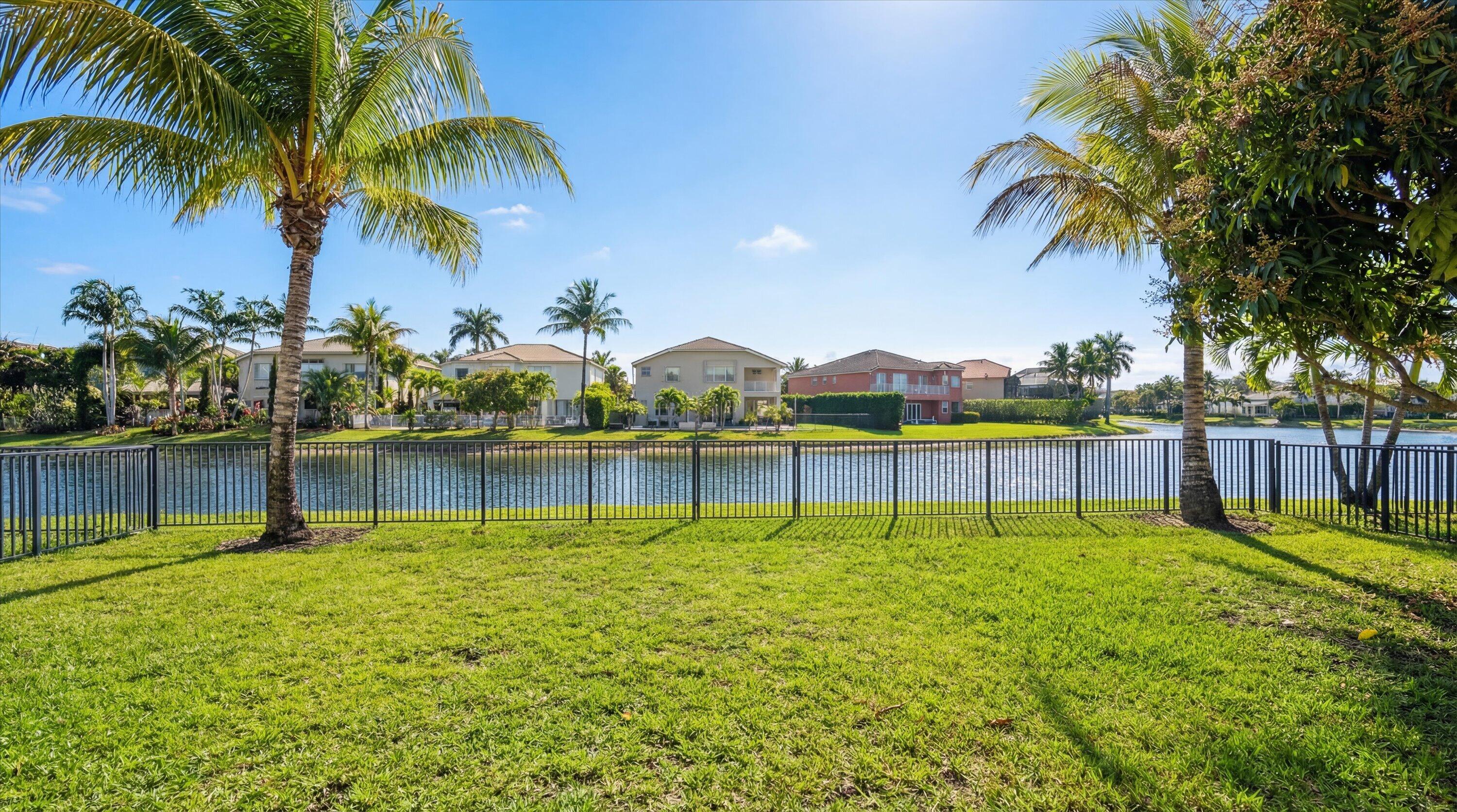 3072 Payson Way Wellington, FL 33414 - Photo 35 of 43 a view of swimming pool with a garden