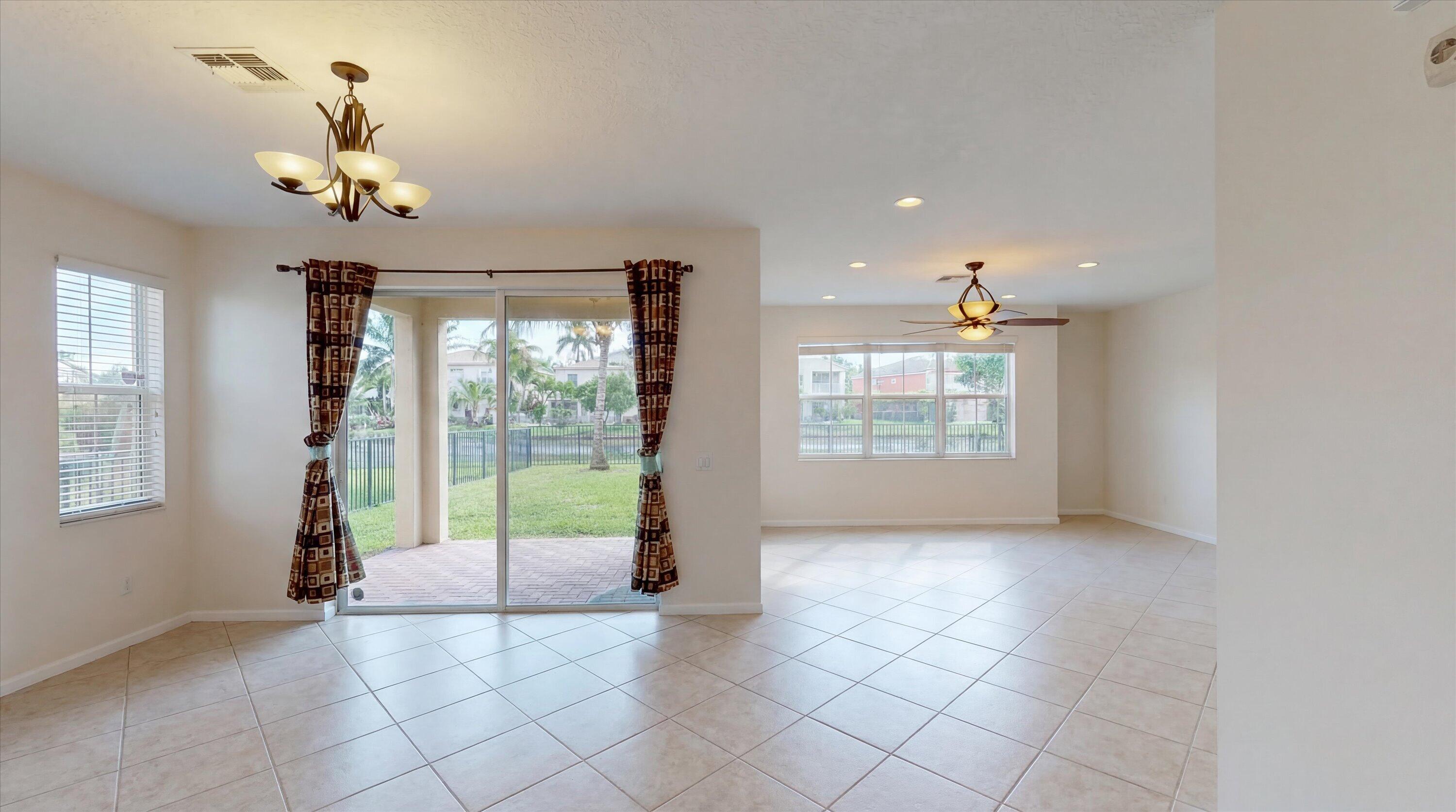 3072 Payson Way Wellington, FL 33414 - Photo 9 of 43 a view of livingroom with window