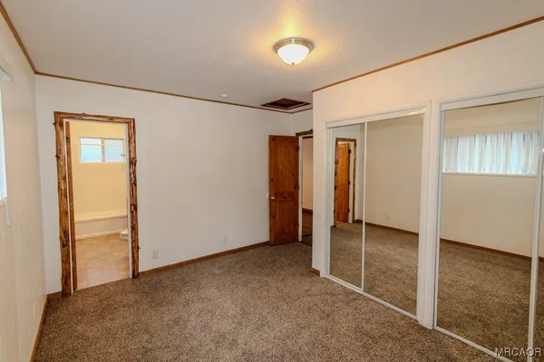 an empty room with closet