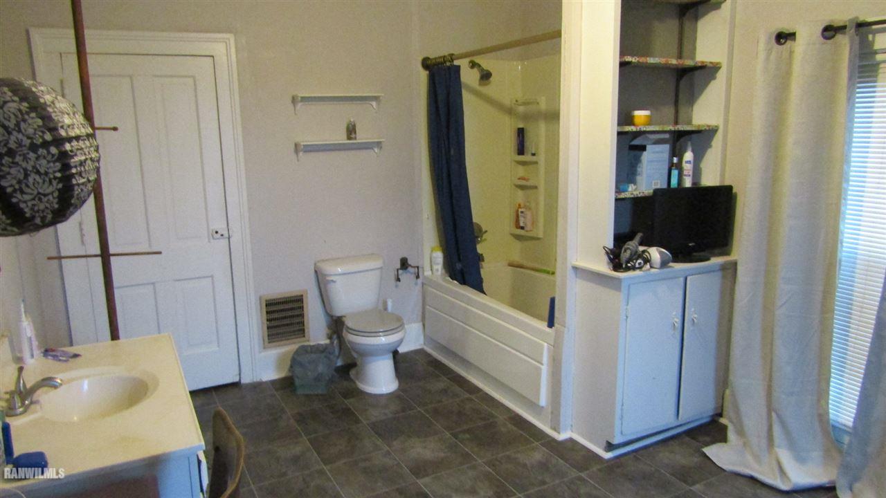 11693 Maple Grove Road Lanark, IL 61046 - Photo 9 of 19 a bathroom with a toilet and a shower