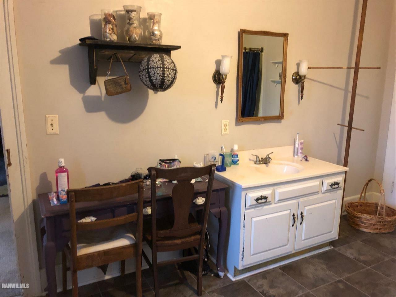 11693 Maple Grove Road Lanark, IL 61046 - Photo 10 of 19 a utility room with a sink cabinets and wooden floor