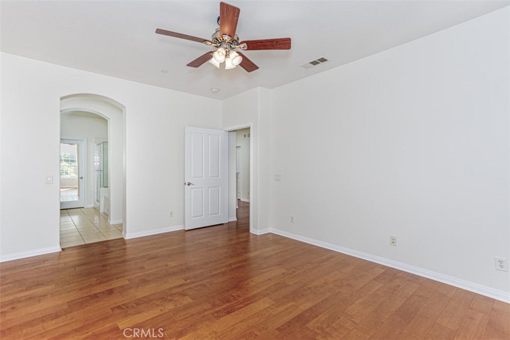 1401 Juliette Way Tustin, CA 92782 - Photo 14 of 27 a view of an empty room with wooden floor