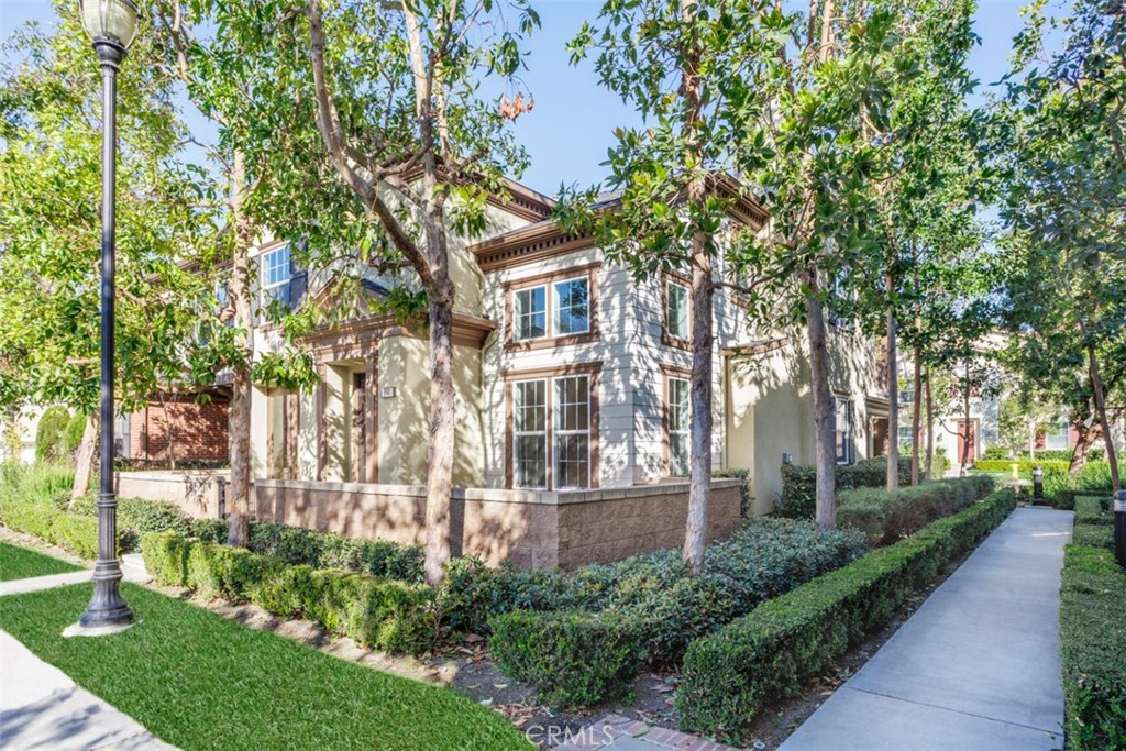 1401 Juliette Way Tustin, CA 92782 - Photo 21 of 27 a view of a house with a garden