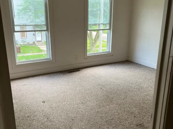 an empty room with closet