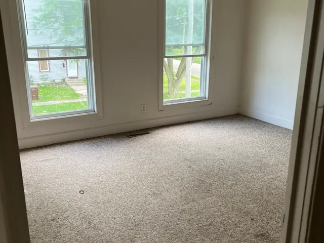 an empty room with closet