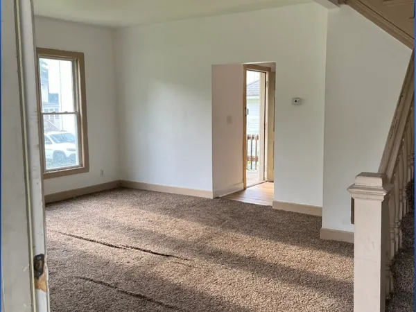 an empty room with windows