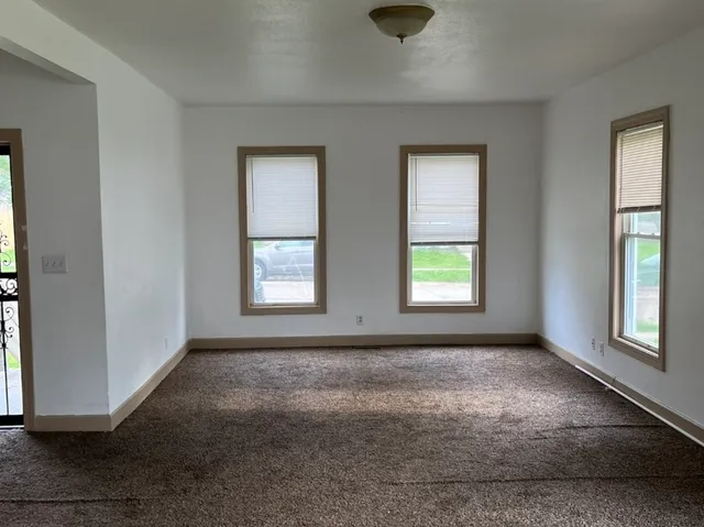 a kitchen with a sink and a window