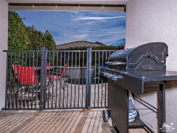 a view of balcony and wooden floor