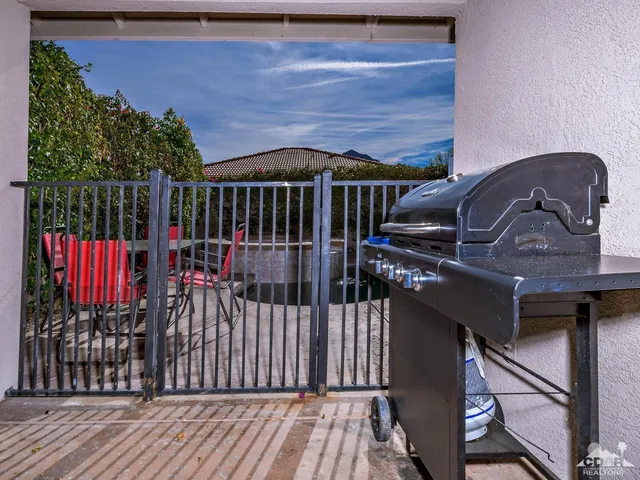 a view of balcony and wooden floor