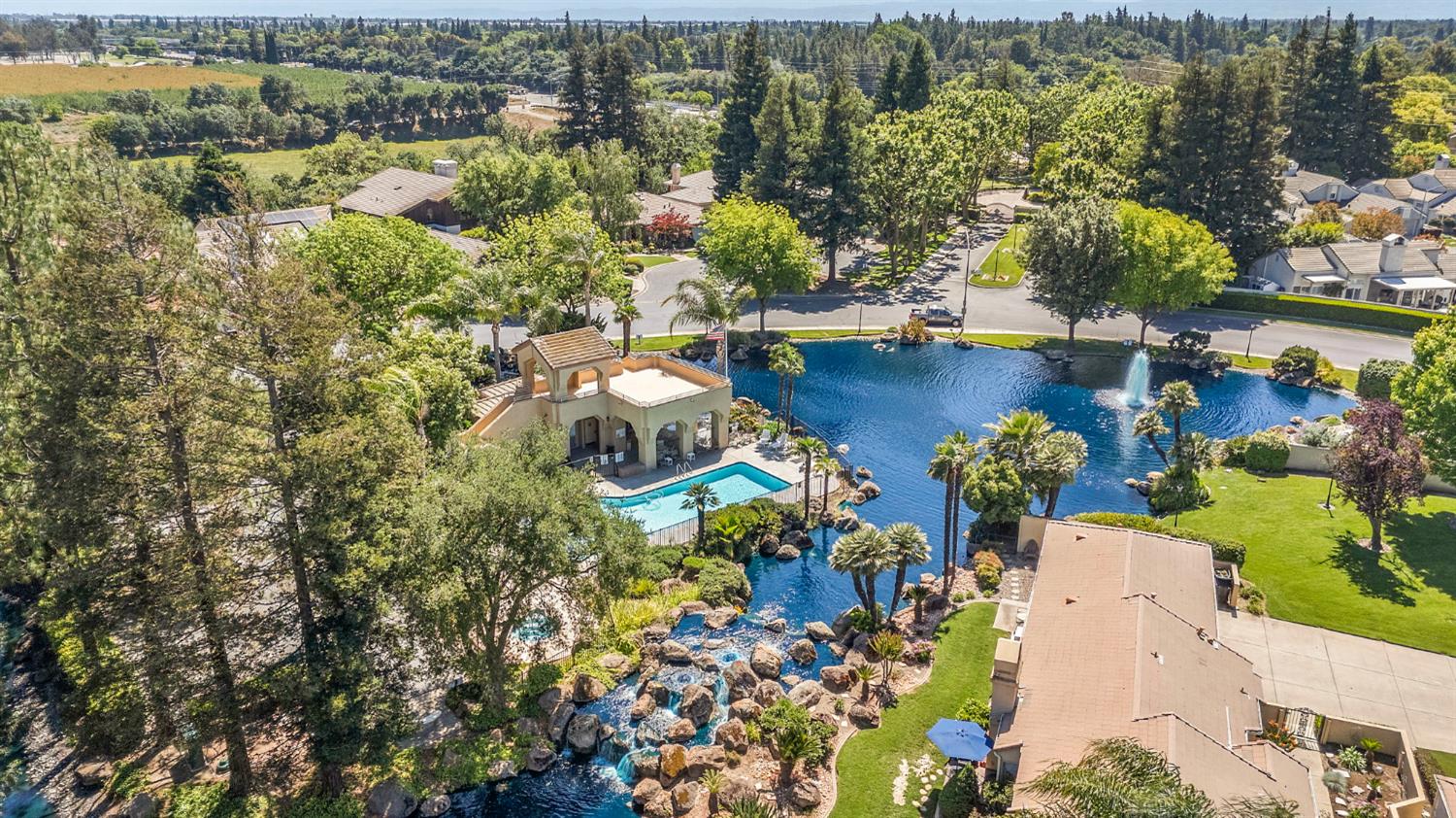 1013 Copper Lake Court Modesto, CA 95355 - Photo 53 of 66 an aerial view of a house with a lake view