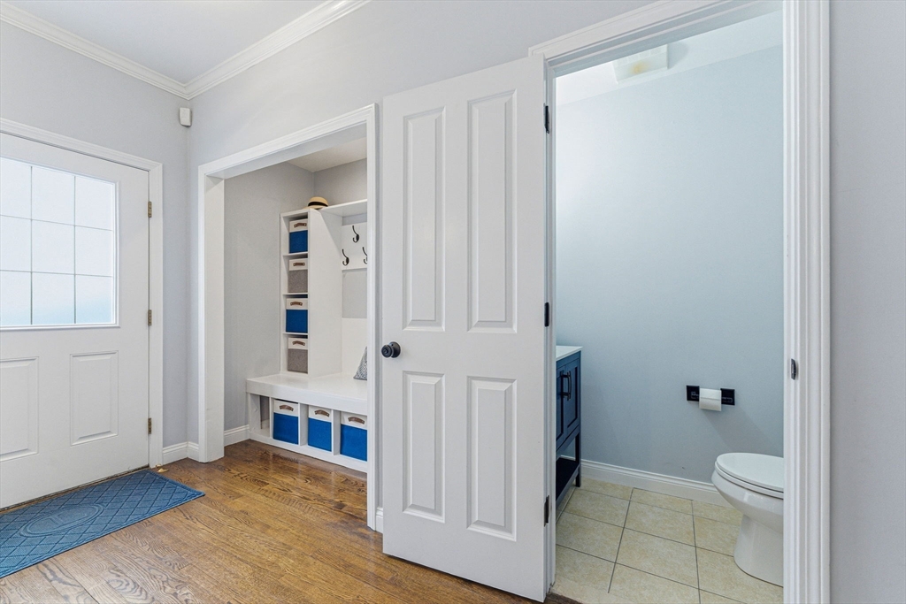 6 Millmont Street, Unit 6 Boston, MA 02119 - Photo 19 of 42 a view of a bathroom with a sink and a toilet