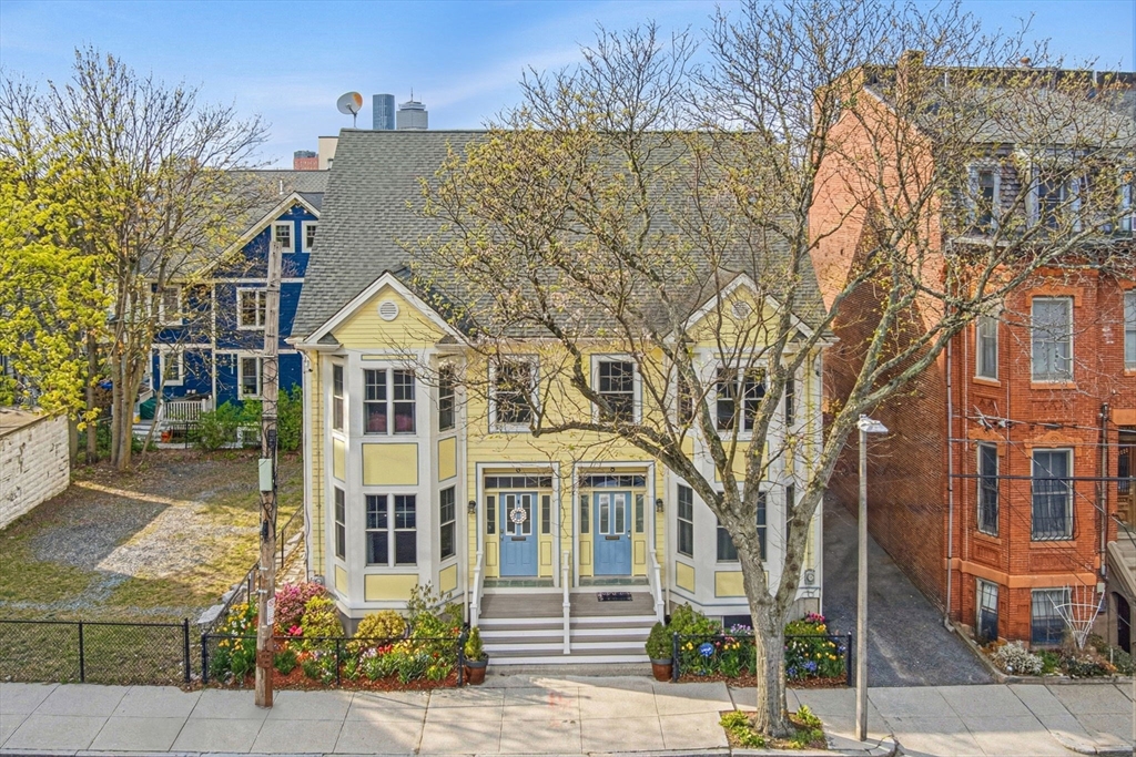 6 Millmont Street, Unit 6 Boston, MA 02119 - Photo 2 of 42 front view of a house with a street