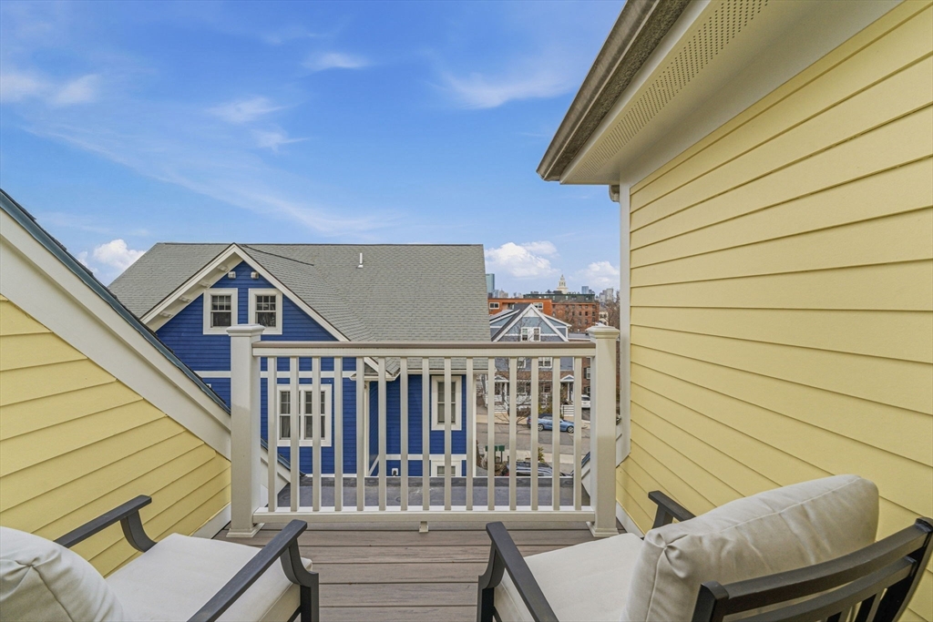 6 Millmont Street, Unit 6 Boston, MA 02119 - Photo 37 of 42 a view of a chair in the balcony