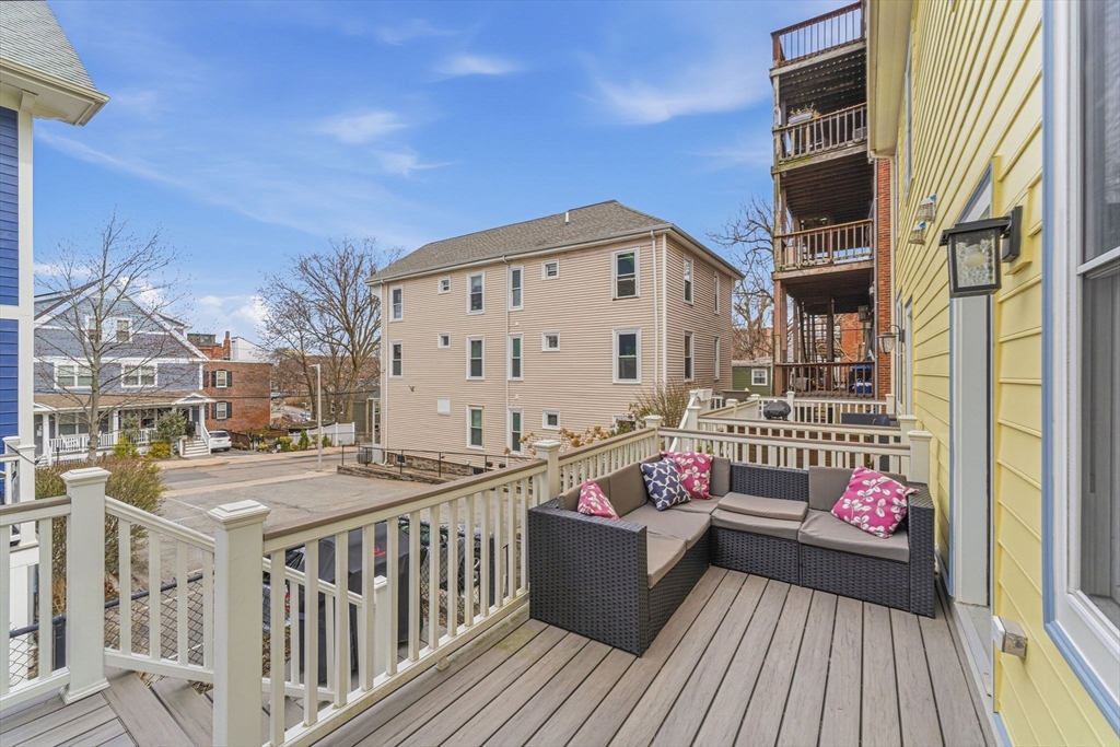 6 Millmont Street, Unit 6 Boston, MA 02119 - Photo 4 of 42 a view of a balcony with sitting area