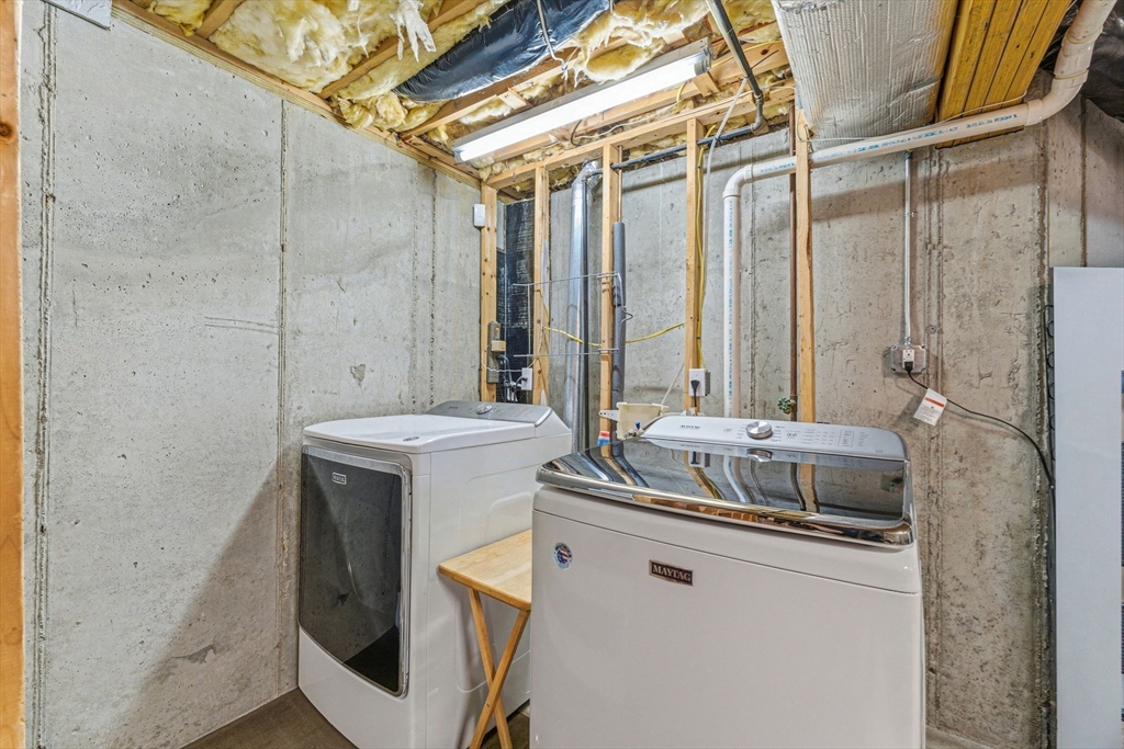 6 Millmont Street, Unit 6 Boston, MA 02119 - Photo 41 of 42 a bathroom with a sink and mirror