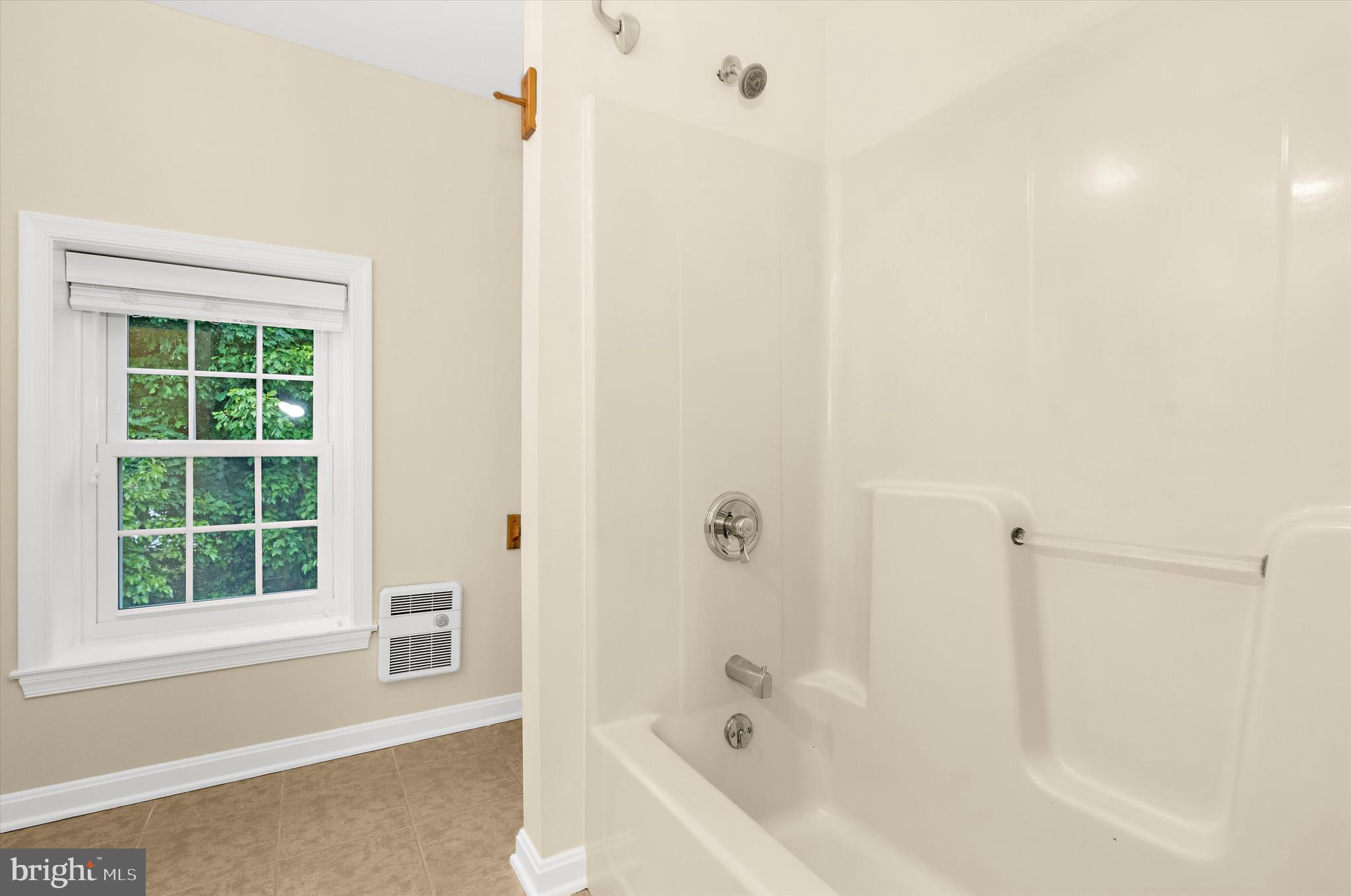 12714 Still Pond Road Still Pond, MD 21667 - Photo 48 of 62 a bathroom with a bathtub and a shower