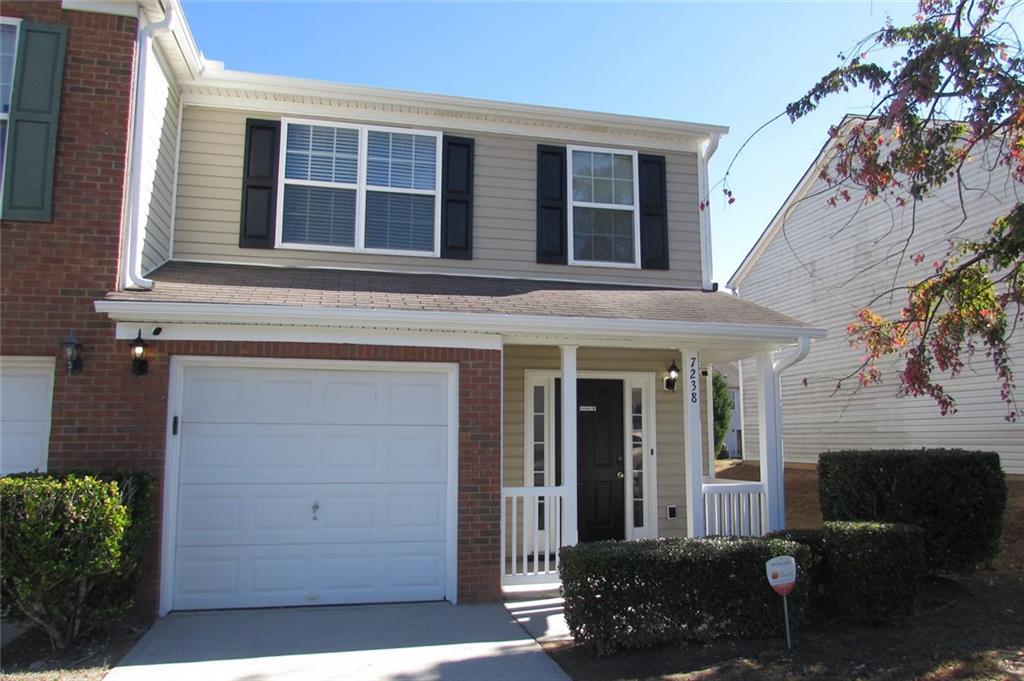 7238 April Court Morrow, GA 30260 - Photo 11 of 11 front view of a house with a yard