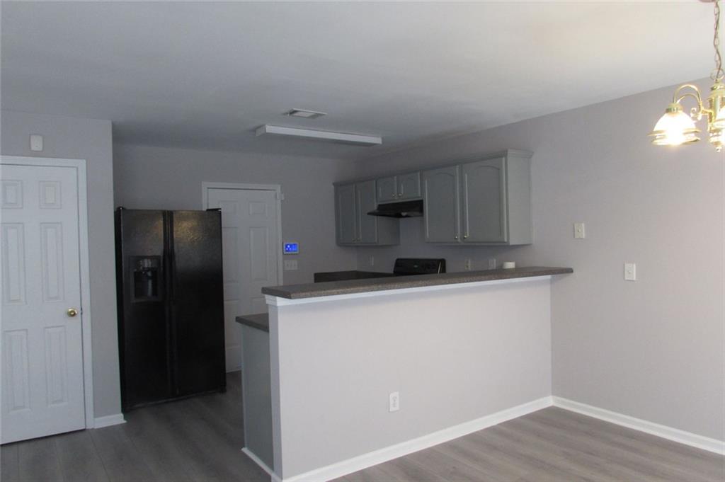 7238 April Court Morrow, GA 30260 - Photo 5 of 11 a room with storage and utility