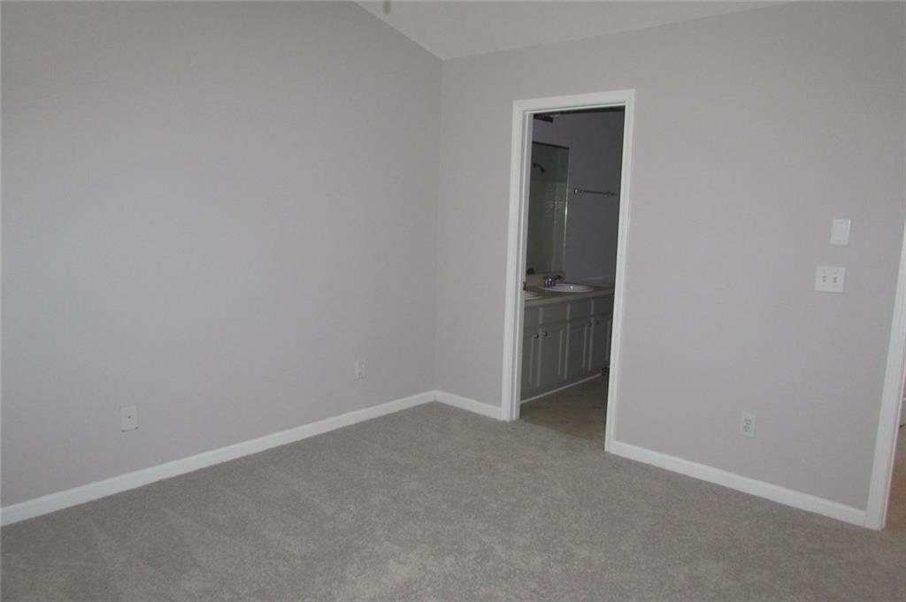 7238 April Court Morrow, GA 30260 - Photo 8 of 11 a view of an empty room