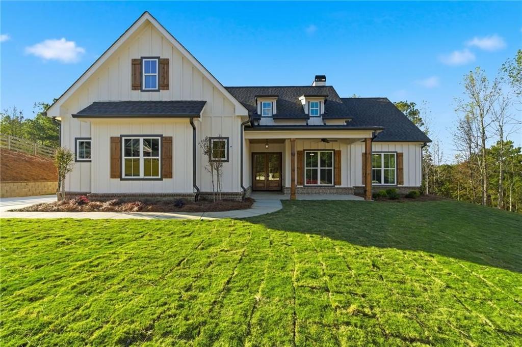 a front view of a house with a yard