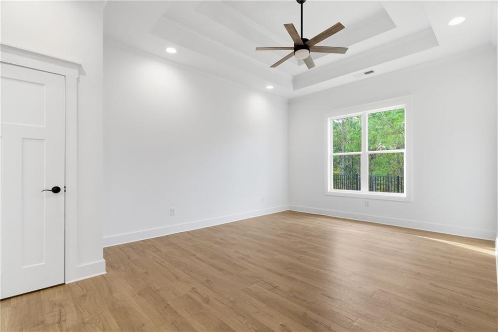 170 Field Stone Circle Jasper, GA 30143 - Photo 15 of 34 wooden floor in an empty room with a window
