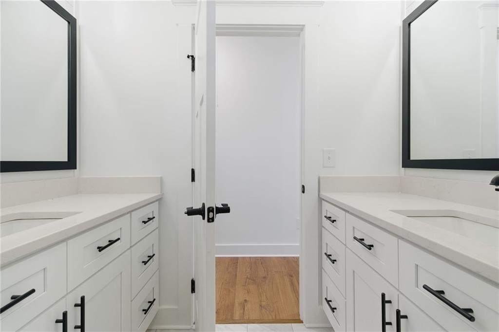 170 Field Stone Circle Jasper, GA 30143 - Photo 28 of 34 a bathroom with a sink and a mirror