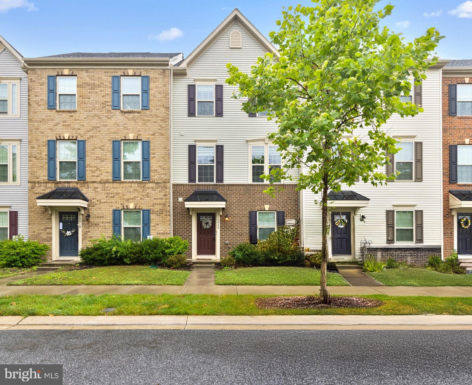 10020 Sandy Run Road Baltimore, MD 21220 - Photo 1 of 19 a front view of a house with a yard and trees