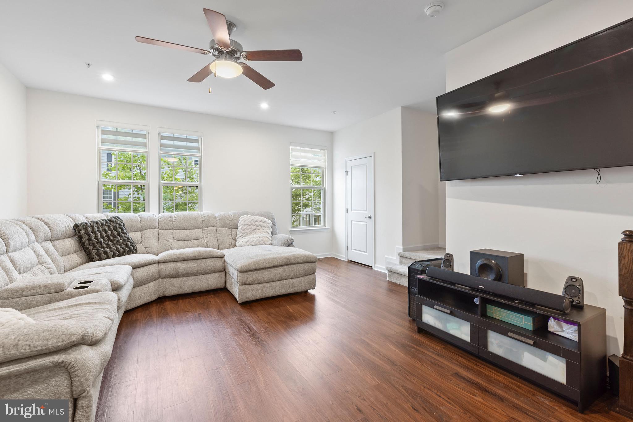 10020 Sandy Run Road Baltimore, MD 21220 - Photo 3 of 19 a living room with furniture and a wooden floor