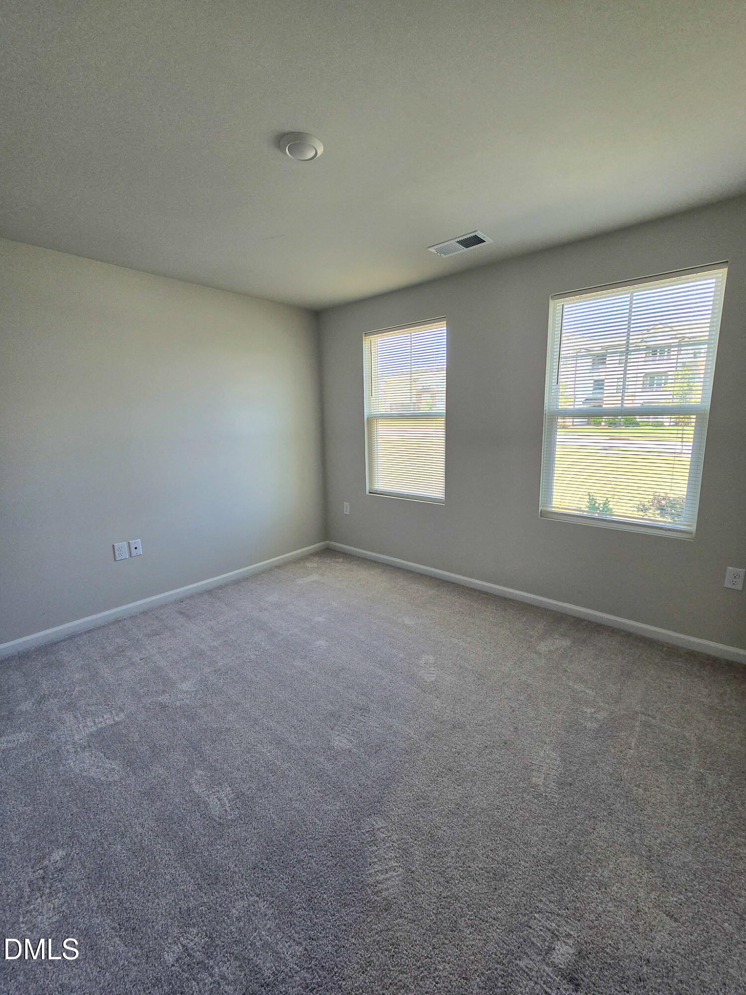 2431 Kasota Lane Raleigh, NC 27610 - Photo 5 of 46 an empty room with windows