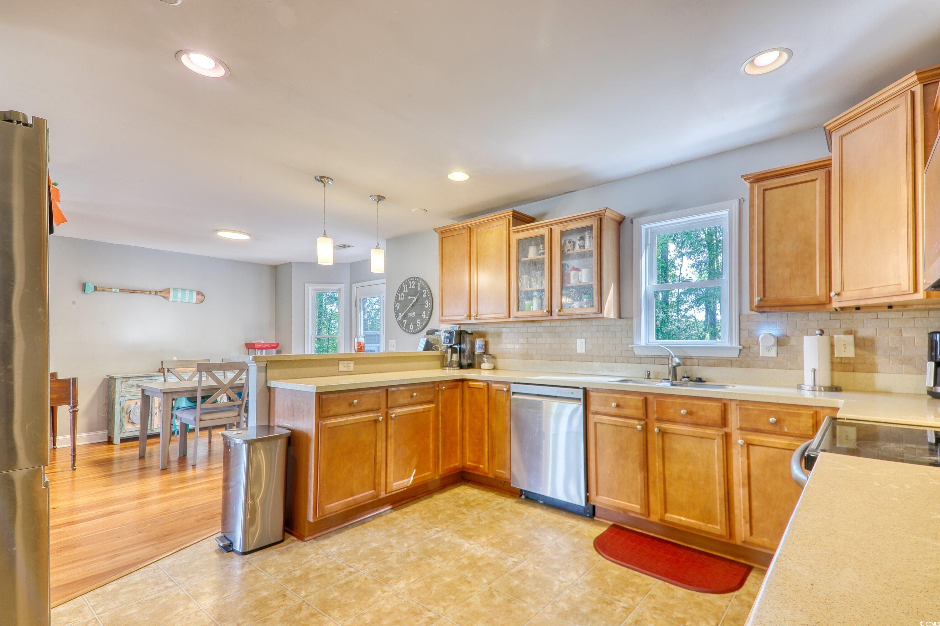 190 Hamilton Way Conway, SC 29526 - Photo 11 of 35 Kitchen featuring a sink, decorative backsplash, s