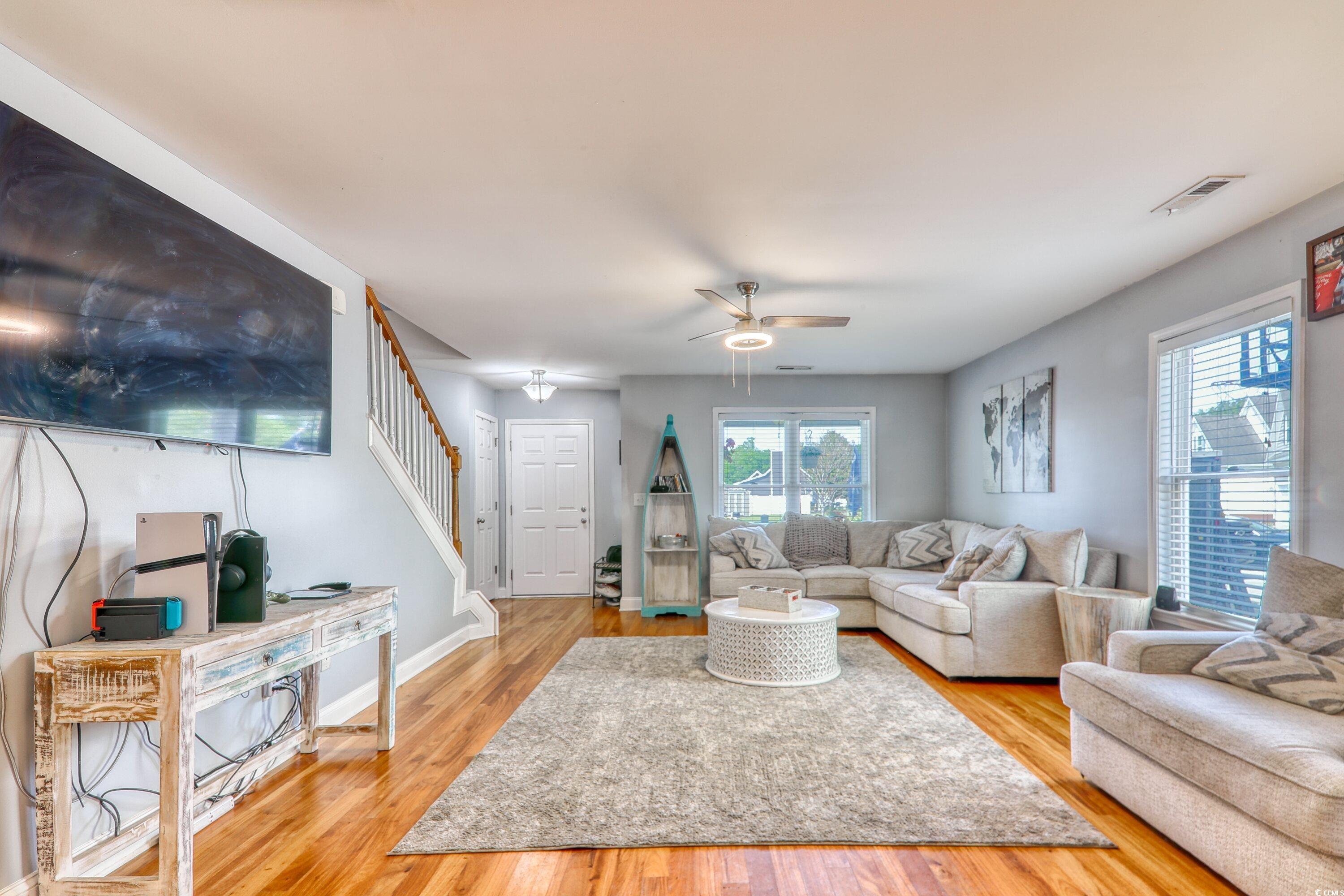 190 Hamilton Way Conway, SC 29526 - Photo 7 of 35 Living room with stairway, a wealth of natural lig