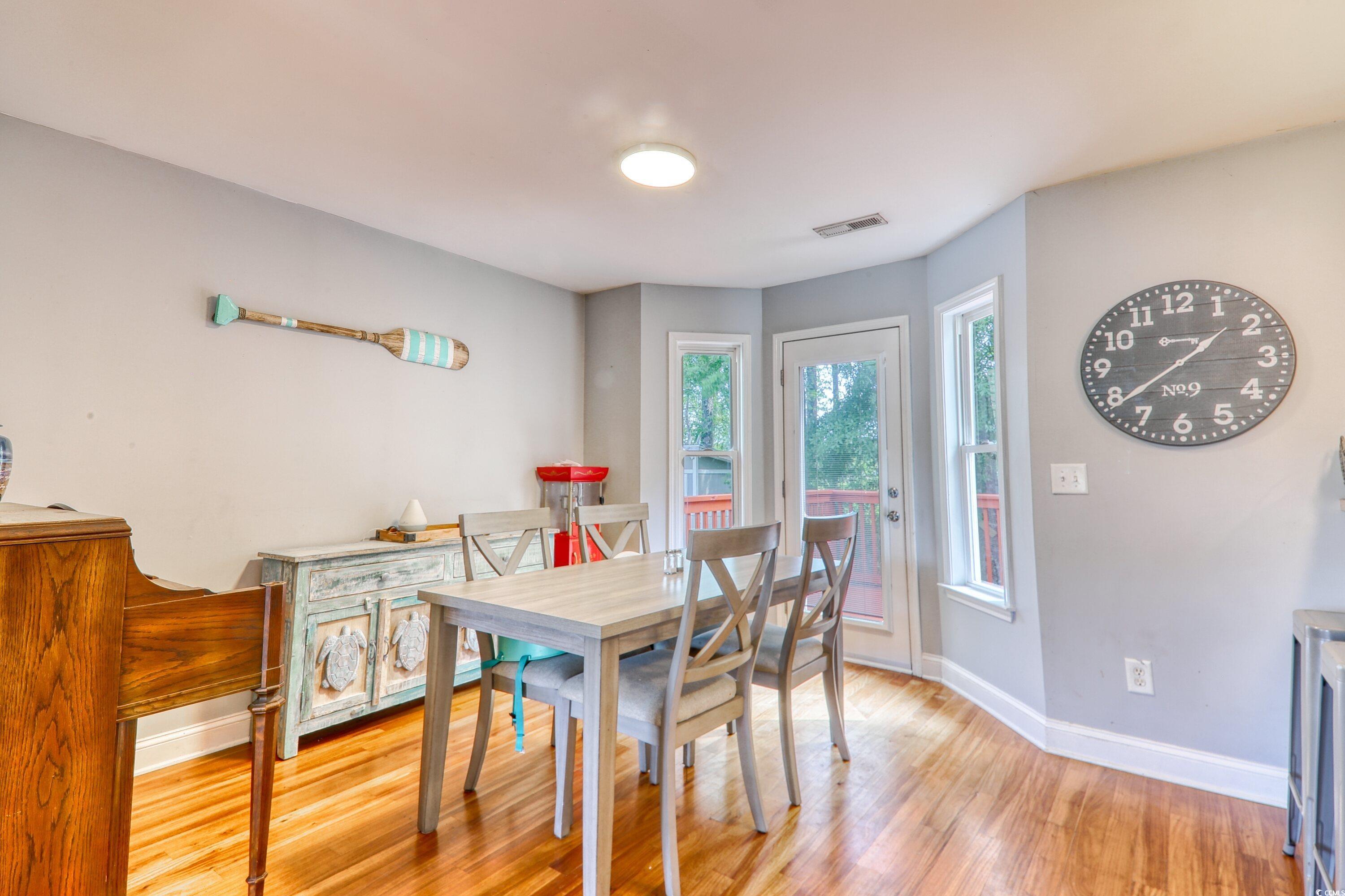 190 Hamilton Way Conway, SC 29526 - Photo 9 of 35 Dining space with baseboards, light wood-style flo