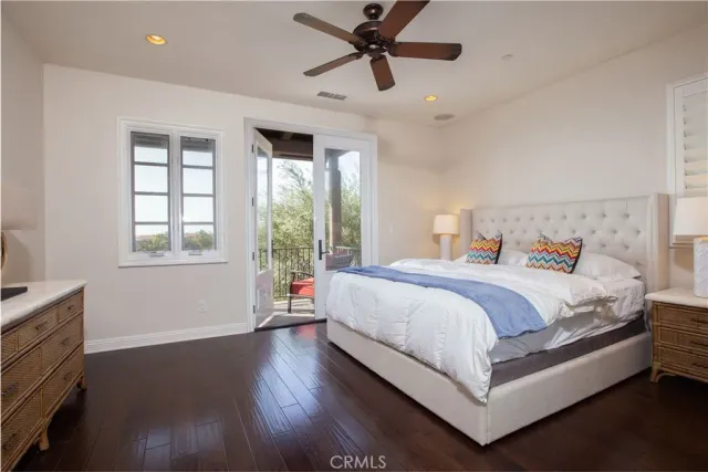 a bedroom with bed and window