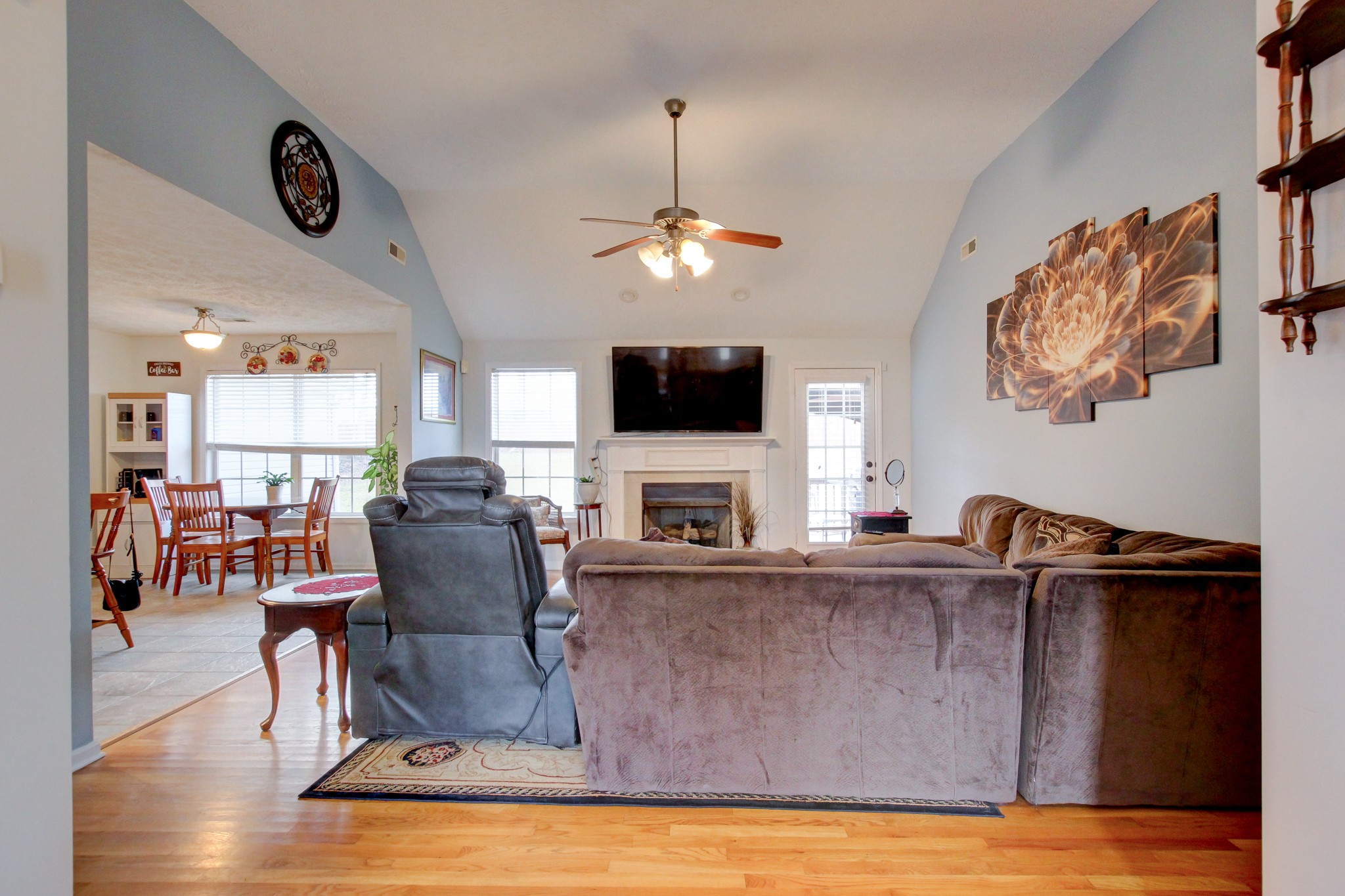 244 Cheshire Road Clarksville, TN 37043 - Photo 12 of 84 a living room with furniture a flat screen tv and kitchen view