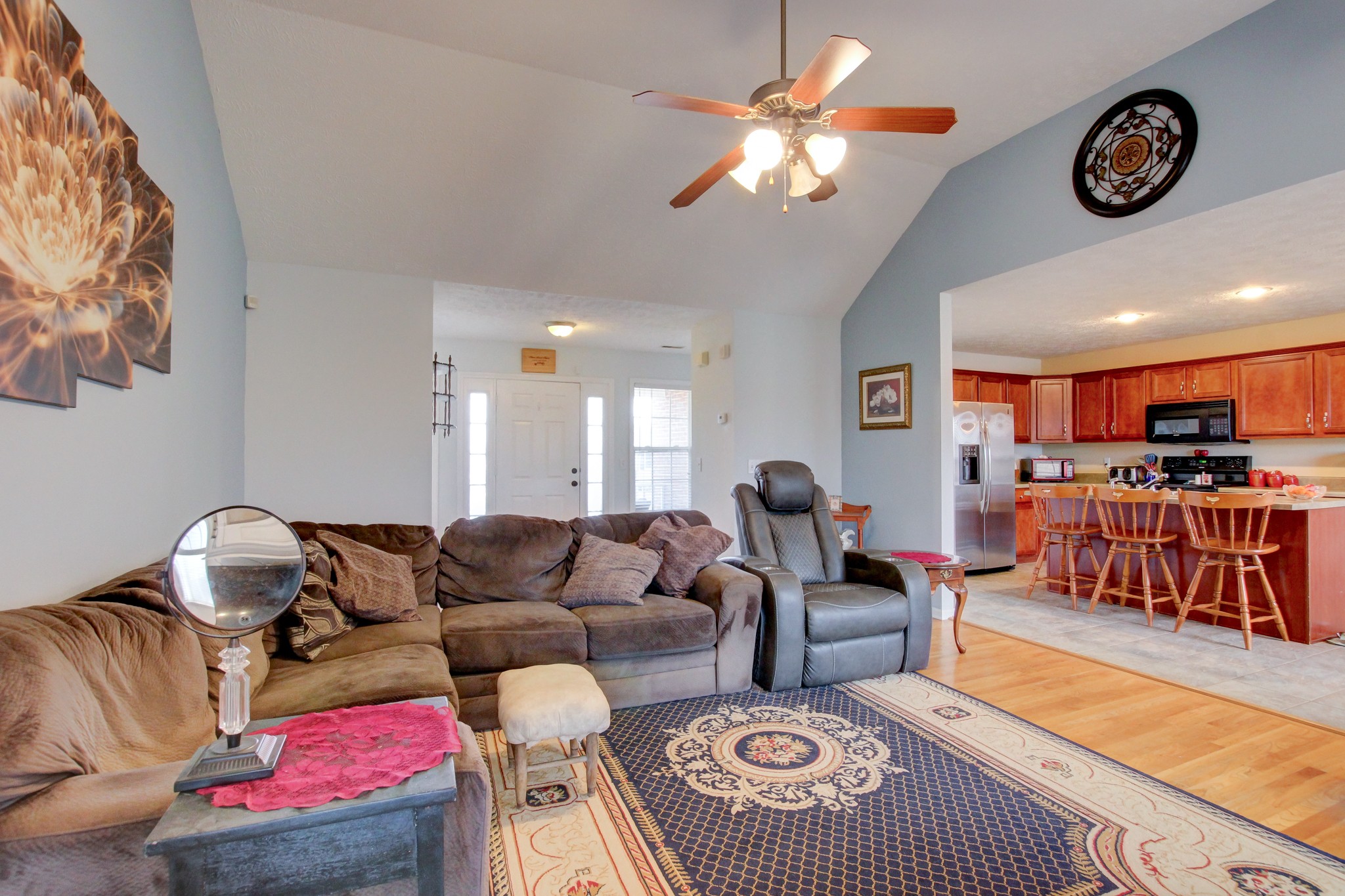 244 Cheshire Road Clarksville, TN 37043 - Photo 18 of 84 a living room with furniture a rug and kitchen view