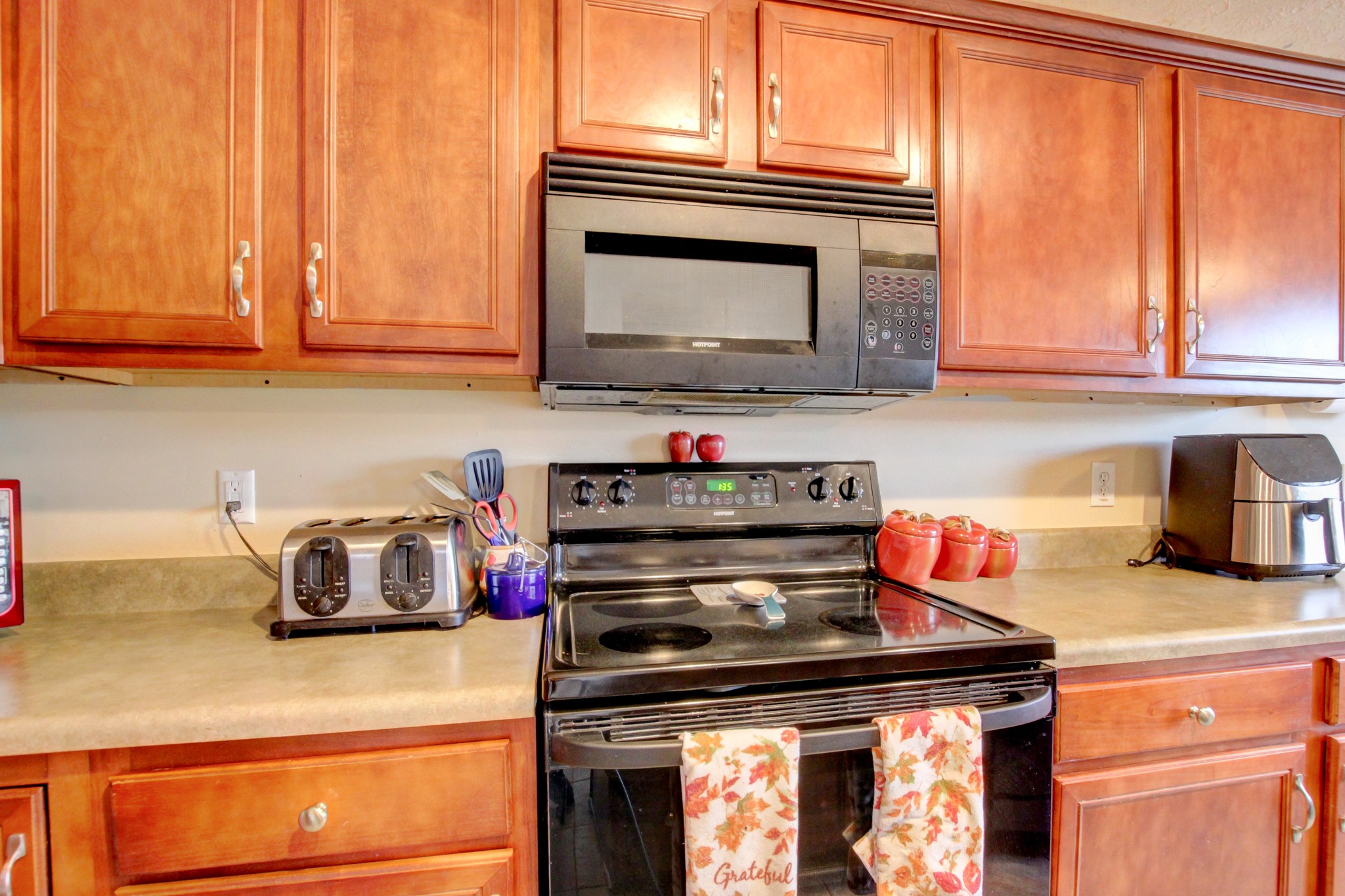 244 Cheshire Road Clarksville, TN 37043 - Photo 27 of 84 a kitchen with a stove and a microwave