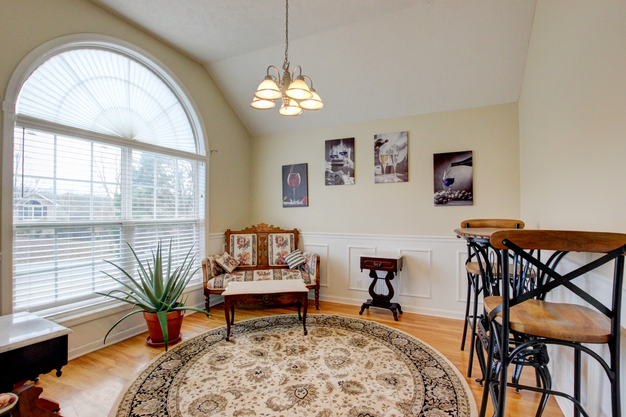 244 Cheshire Road Clarksville, TN 37043 - Photo 33 of 84 a living room with furniture a dining table and a chandelier