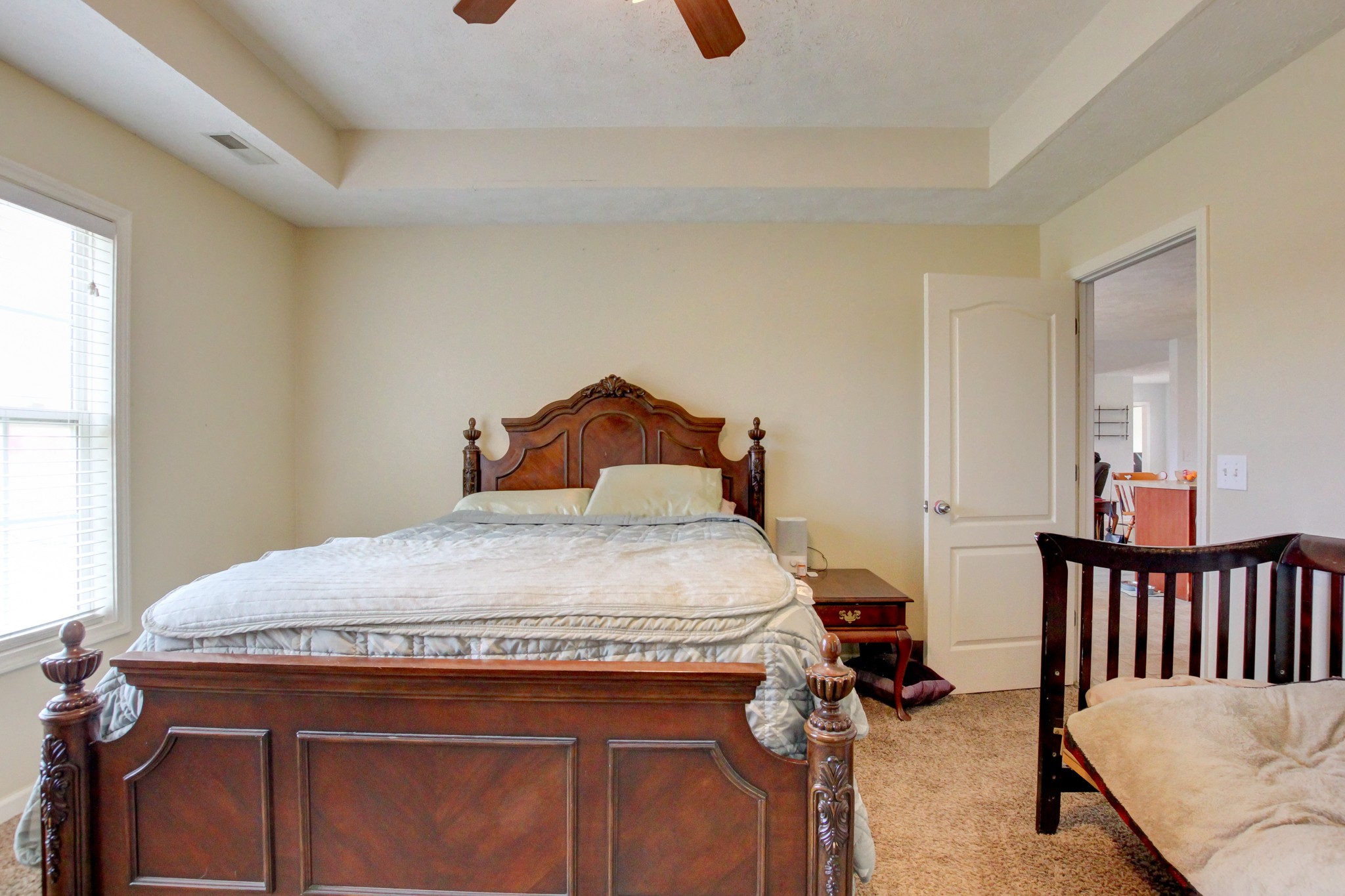 244 Cheshire Road Clarksville, TN 37043 - Photo 47 of 84 a bedroom with a bed and wooden floor