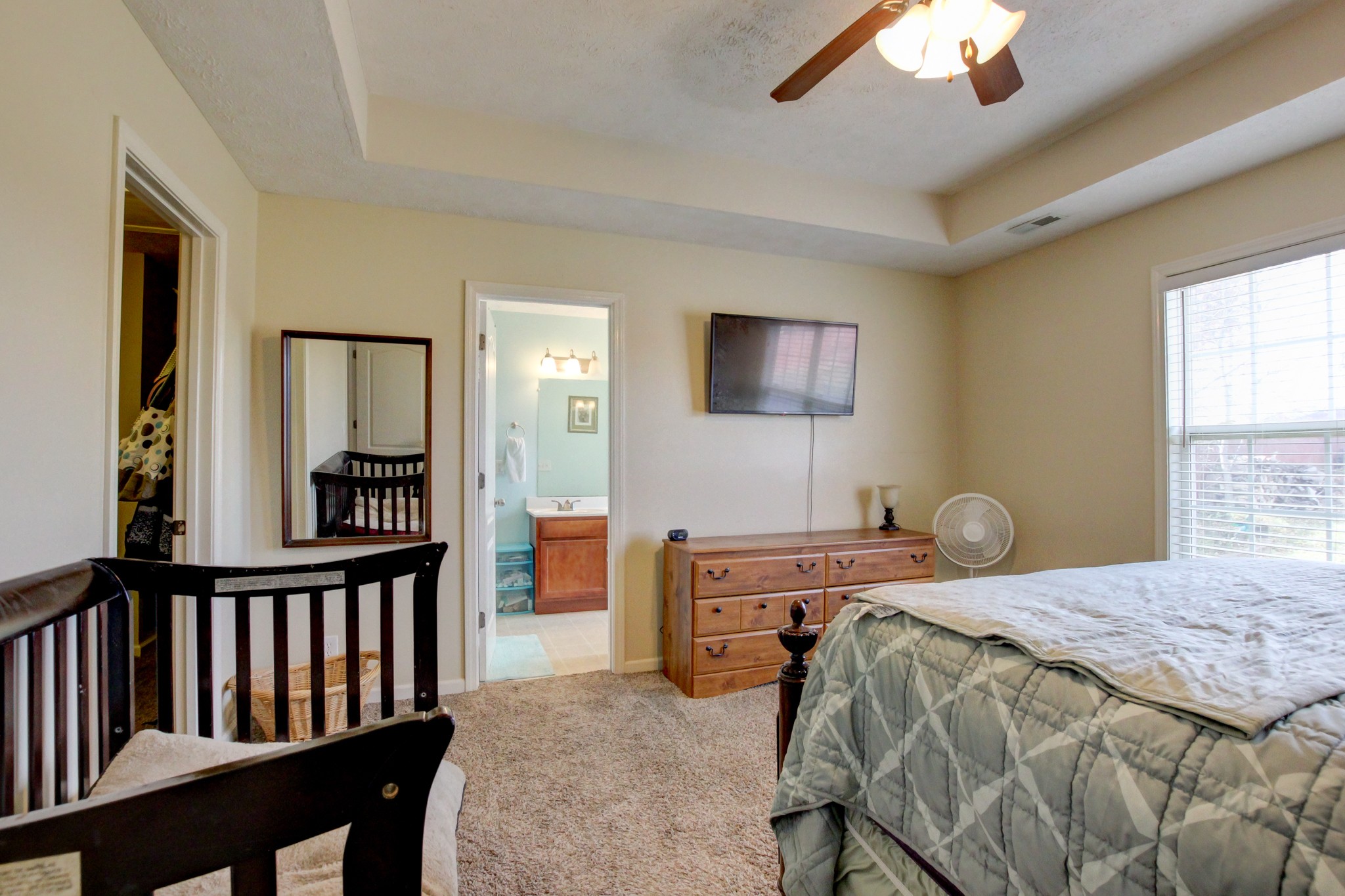 244 Cheshire Road Clarksville, TN 37043 - Photo 50 of 84 a bedroom that has a bed and a tv in it