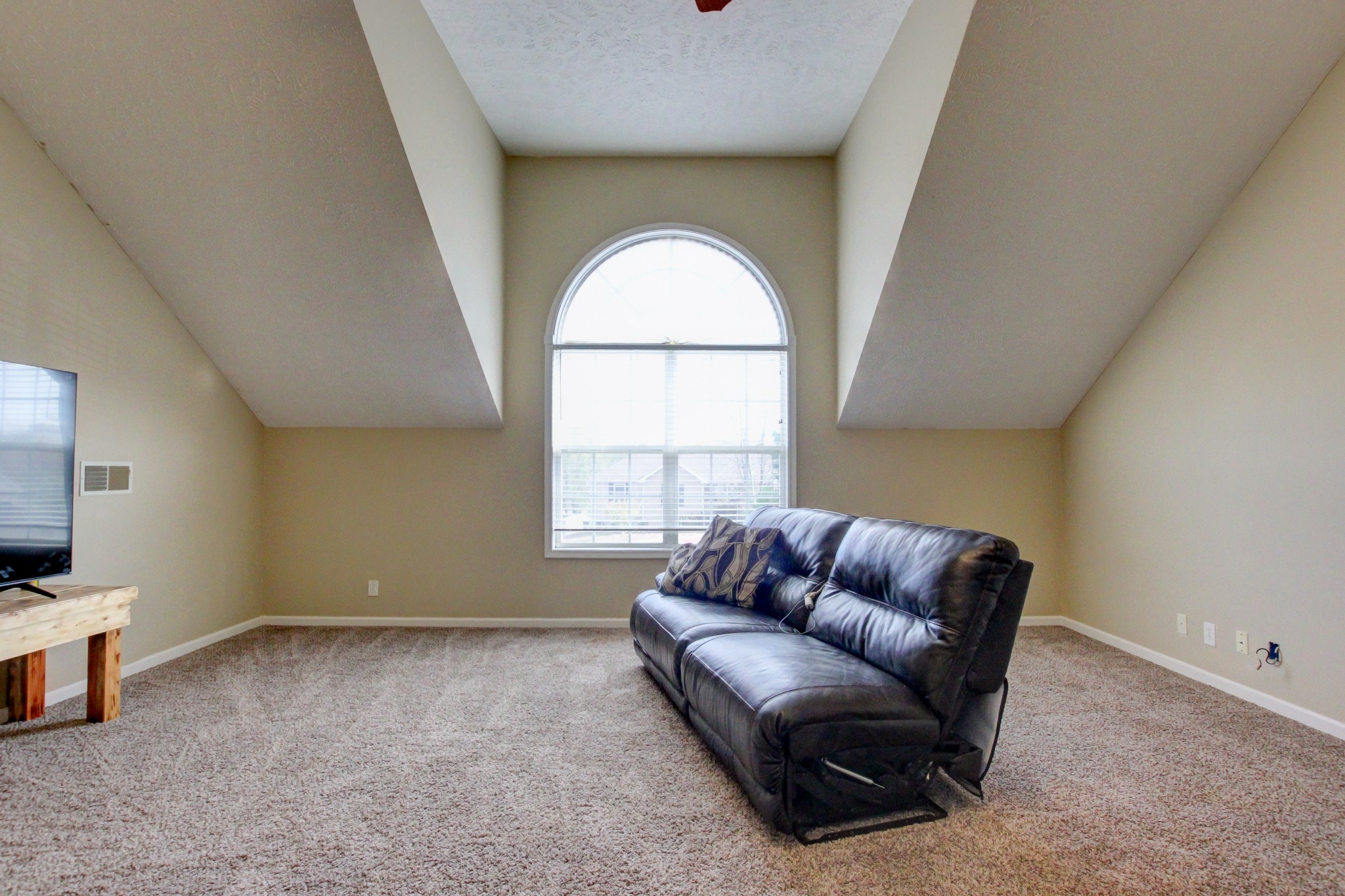 244 Cheshire Road Clarksville, TN 37043 - Photo 55 of 84 a living room with furniture and a flat screen tv