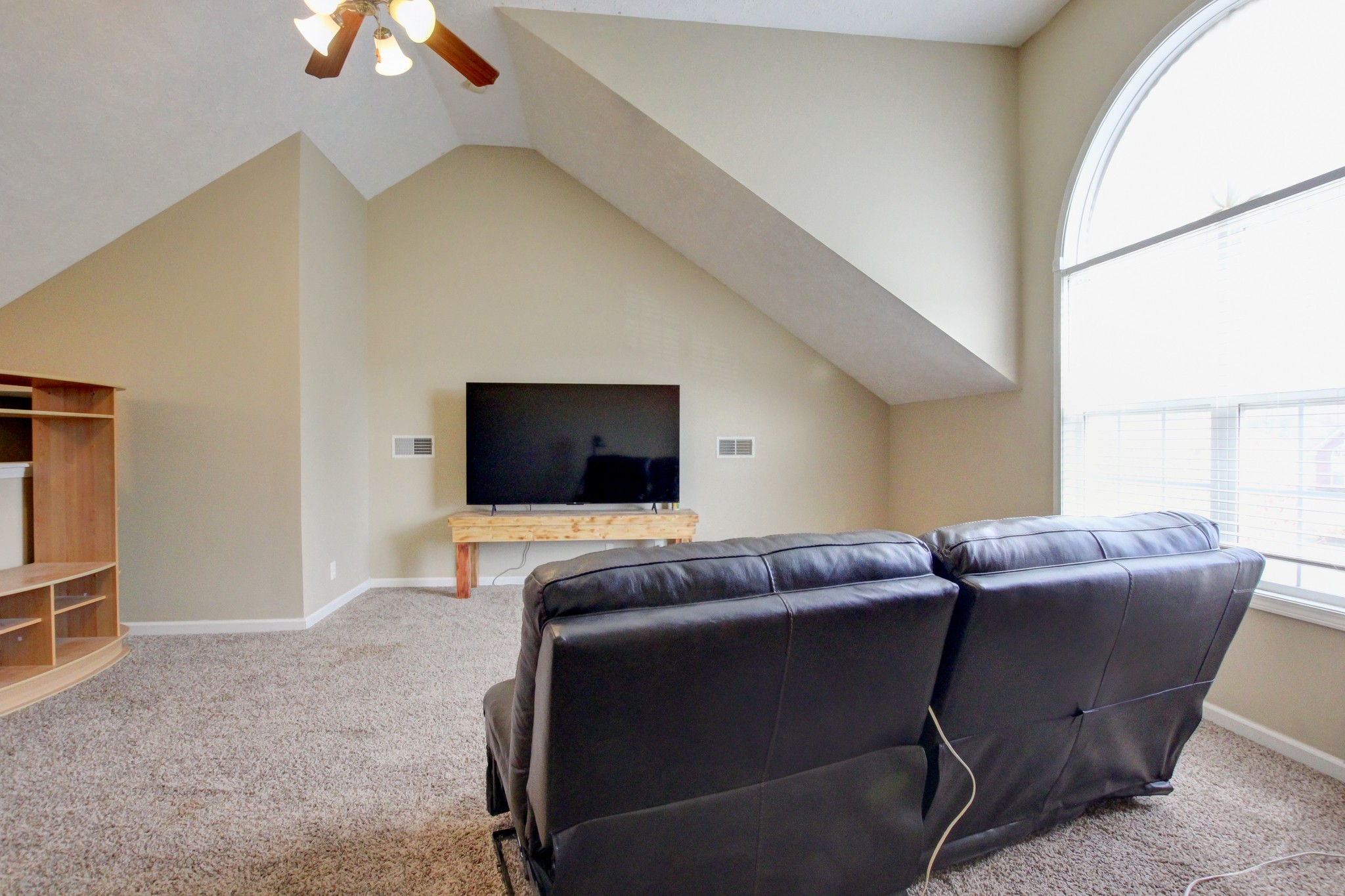 244 Cheshire Road Clarksville, TN 37043 - Photo 58 of 84 a living room with furniture and a flat screen tv