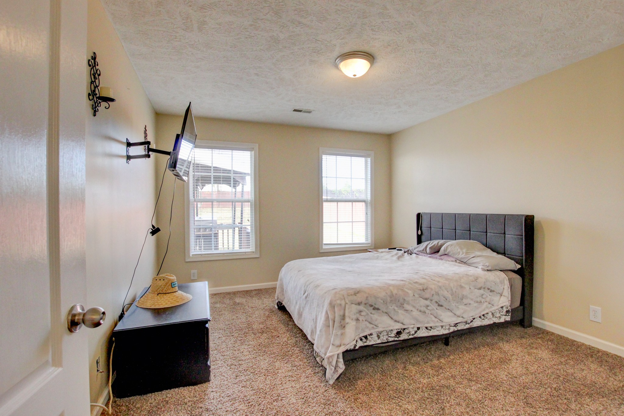 244 Cheshire Road Clarksville, TN 37043 - Photo 59 of 84 a bedroom with a bed and a window