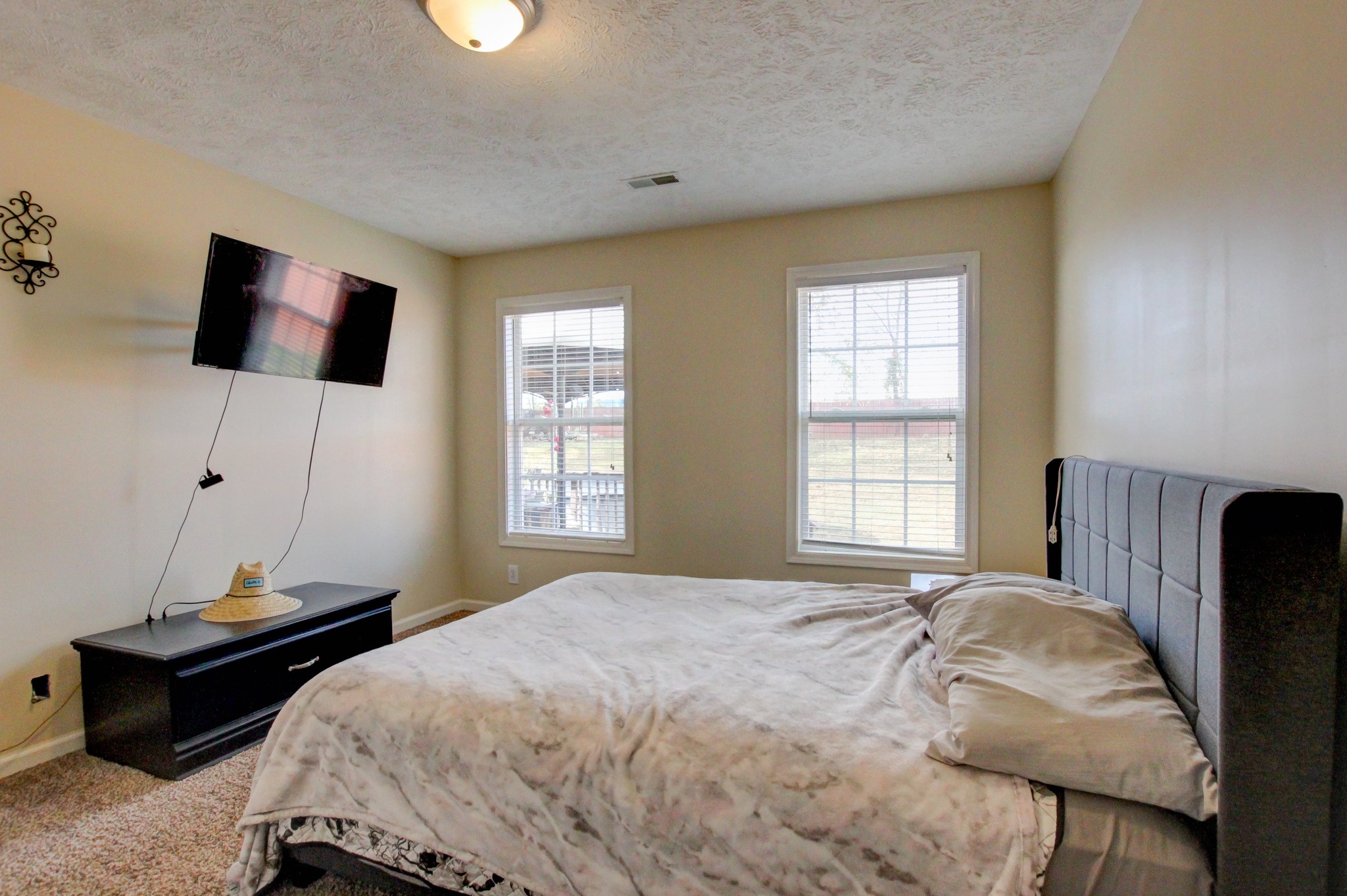 244 Cheshire Road Clarksville, TN 37043 - Photo 61 of 84 a bedroom with a bed and a window
