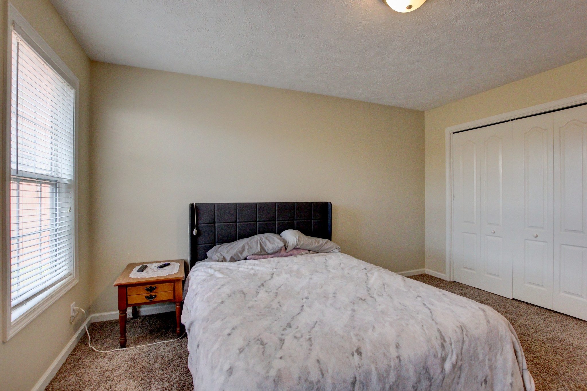 244 Cheshire Road Clarksville, TN 37043 - Photo 64 of 84 a bedroom with a bed and window