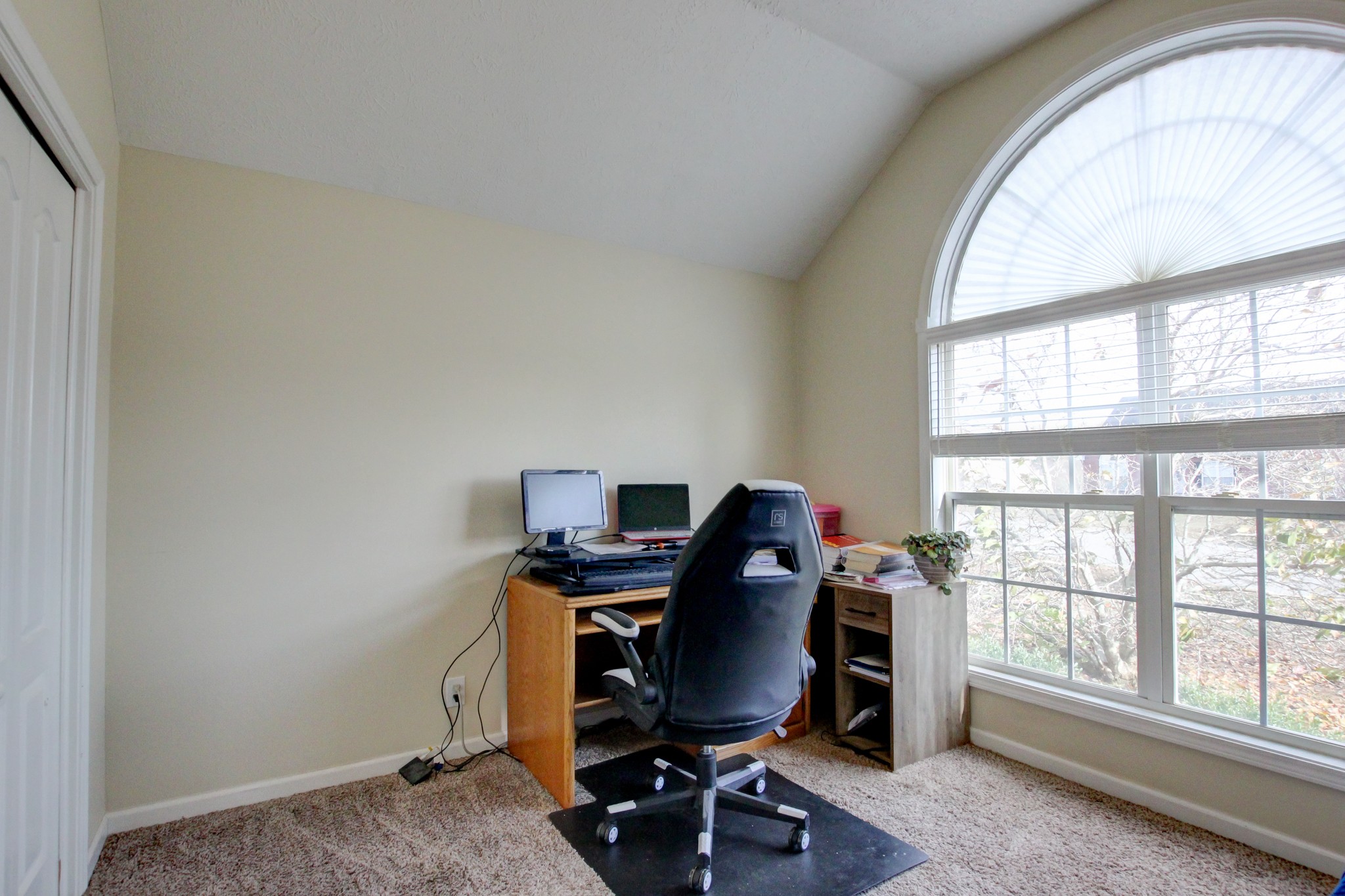 244 Cheshire Road Clarksville, TN 37043 - Photo 71 of 84 a view of a workspace with furniture and a window