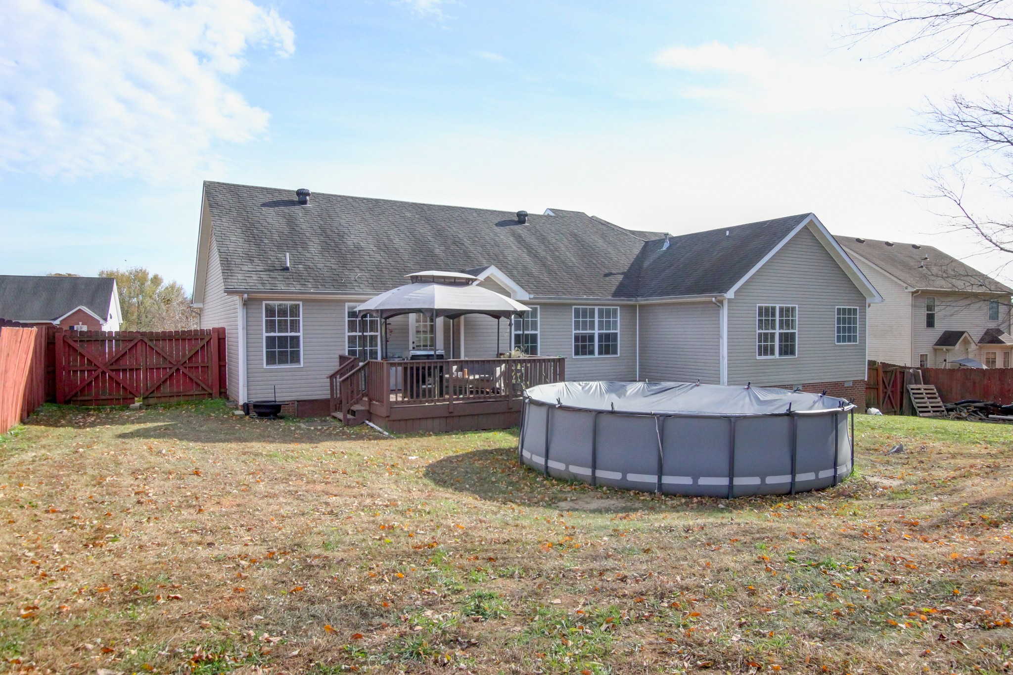 244 Cheshire Road Clarksville, TN 37043 - Photo 80 of 84 a front view of a house with a yard and garage