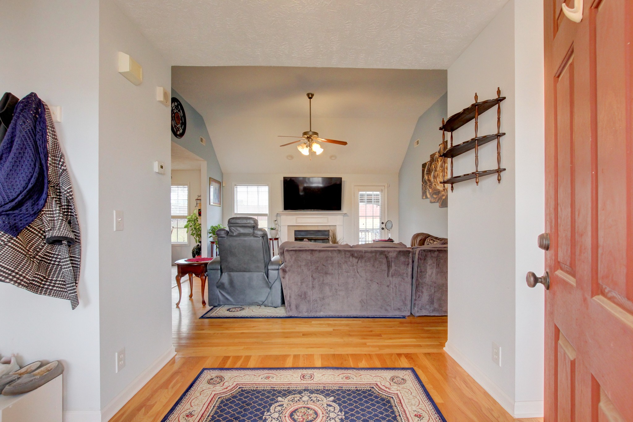 244 Cheshire Road Clarksville, TN 37043 - Photo 10 of 84 a living room with furniture and a flat screen tv