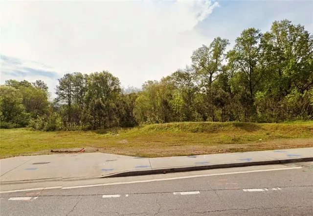 a view of a yard with an outdoor space