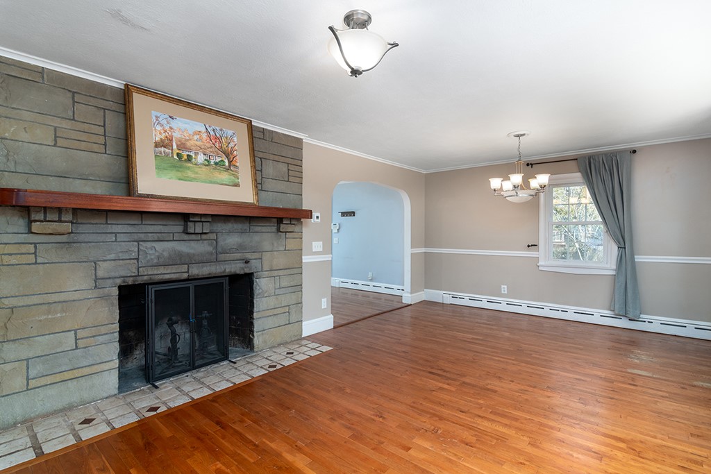 41 Bruce Lane Warwick, RI 02886 - Photo 5 of 30 Living room 1st floor with fireplace.